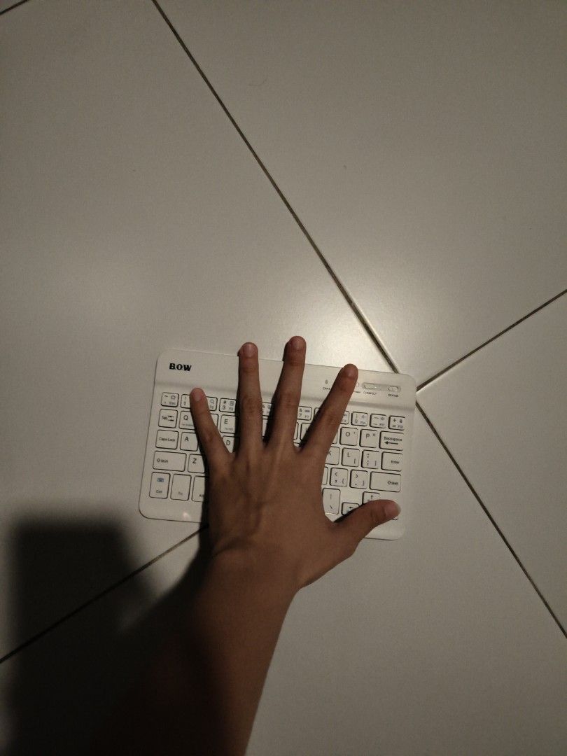 Wireless Tiny Keyboard (Category: Computer Keyboard) located in Singapore. Submitted by justsomeonerandom (Listing ID 1372593042, Image 3). Description: Never used this because I don't need it.