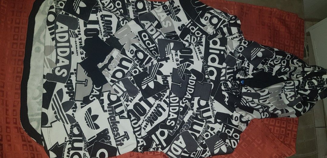 Adidas hoodie legit (Category: Coats, Jackets and Outerwear) located in Pasig City. Submitted by margarette14 (Listing ID 1375879858, Image 1). Description: legit adidas hoodie fit to size med to large super ganda no issue 2x used.