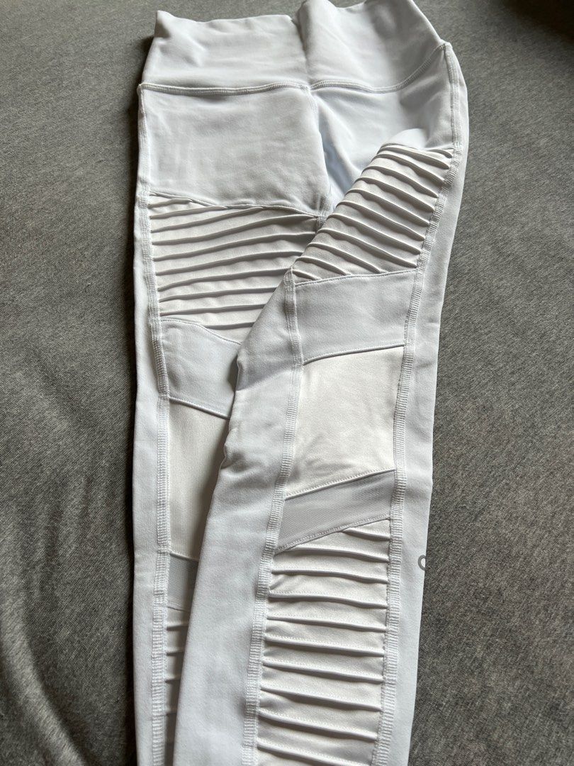ALO Yoga Moto Leggings XXS White (Category: Activewear) located in Singapore. Submitted by sweetiebuns (Listing ID 1375859673, Image 1). Description: Alo Yoga Moto Leggings - Brand new (without tag) - Size: XXS - Color: White - Features: Mesh paneling, moto detailing - Style: High-waisted - Perfect for: Yoga and everyday wear.