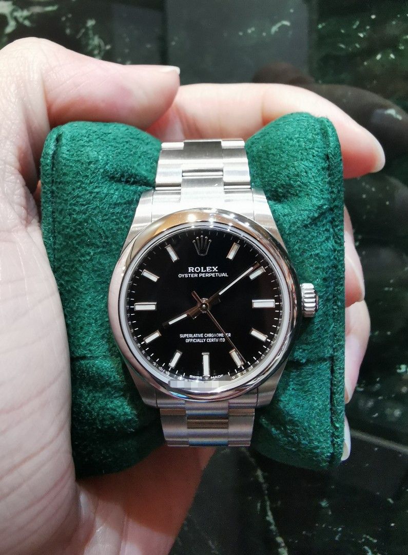 August 2023 Rolex Oyster perpetual OP31 31mm black 277200 (Category: Watches) located in Singapore. Submitted by hengwatch (Listing ID 1375986969, Image 1). Description: Rolex Oyster perpetual OP 31 black dial Model number 277200 Mint condition Comes with box and cert dated Aug 2023 With white hang tag with matching serial number Selling for $7800 Subscribe to our tele-gram group for constant updates //t.me/HengWatch Hsbc and standard chartered a