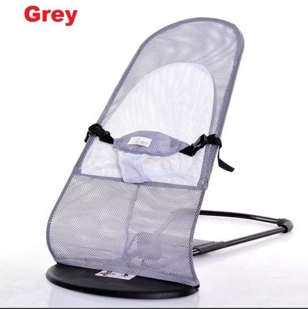 Baby Bouncer Rocking Chair Infant Seat Grey (Category: Infant Playtime) located in Singapore. Submitted by 1003ivy1003 (Listing ID 1375883018, Image 1). Description: Grey baby bouncer with mesh fabric for breathability. Features a supportive headrest and a sturdy, foldable frame. Suitable for infants and newborns. Easy to clean and maintain. Provides a comfortable and safe place for your baby to relax and play..
