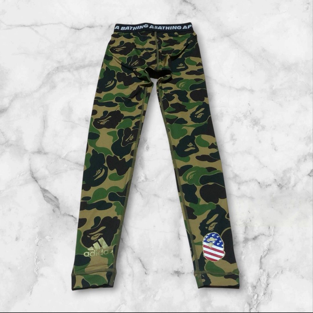 BAPE X ADIDAS SB TIGHTS COMPRESSION PANTS GREEN CAMO AUTHENTIC (Category: Activewear) located in Urdaneta. Submitted by josephragontonjr95 (Listing ID 1376012718, Image 2). Description: BAPE X ADIDAS SB TIGHTS COMPRESSION PANTS GREEN CAMO AUTHENTIC SIZE XSMALL WIDTH 21-32 LENGTH 33.5 LEG OPENING 3-5.5 FLAWS: NONE CONDITION: EXCELLENT COLOR RATE: 9.5/10 4000 + SHIPPING FEE.