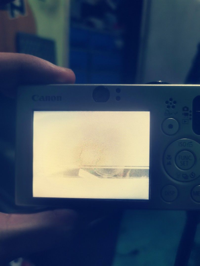 Canon digital Ixus 70 (Category: Cameras) located in Caloocan City. Submitted by psychen09 (Listing ID 1375891936, Image 3). Description: Canon digital Ixus 70 WITH ISSUE! !! Constant flickering and whitening sa lcd:(( doesn't flicker that much if di mo ginalaw, tyambahan po. Can still take pictures and walang problema sa output and may peekhole naman siya !! For 500 nalang. Kayo na magpaayos. Kasama na po yung battery charger.