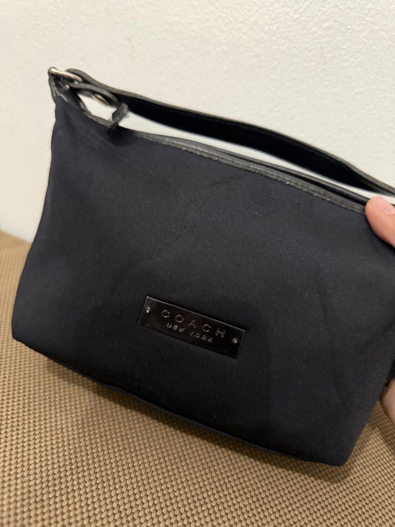 Coach neoprene micro handbag (Category: Luxury Bags & Wallets) located in Quezon City. Submitted by vianca13 (Listing ID 1375947099, Image 3). Description: Coach neoprene micro handbag .