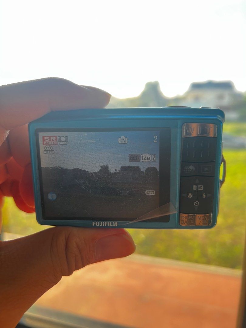 Fujifilm digicam Z70 - w/ box and strap (Category: Cameras) located in Binan City. Submitted by rl.ldl (Listing ID 1375841083, Image 1). Description: 📸 FUJIFILM Z70 / complete w/ box, charger, and strap 📸 RFS: Barely used, underutilized Resolution: 12 MP Sensor: 1/2.3 CCD Focal Length: 36-180mm Screen size: 2.7” Storage: SD/SDHC Weight: 124 g issues: screen sprites DM for mor details.
