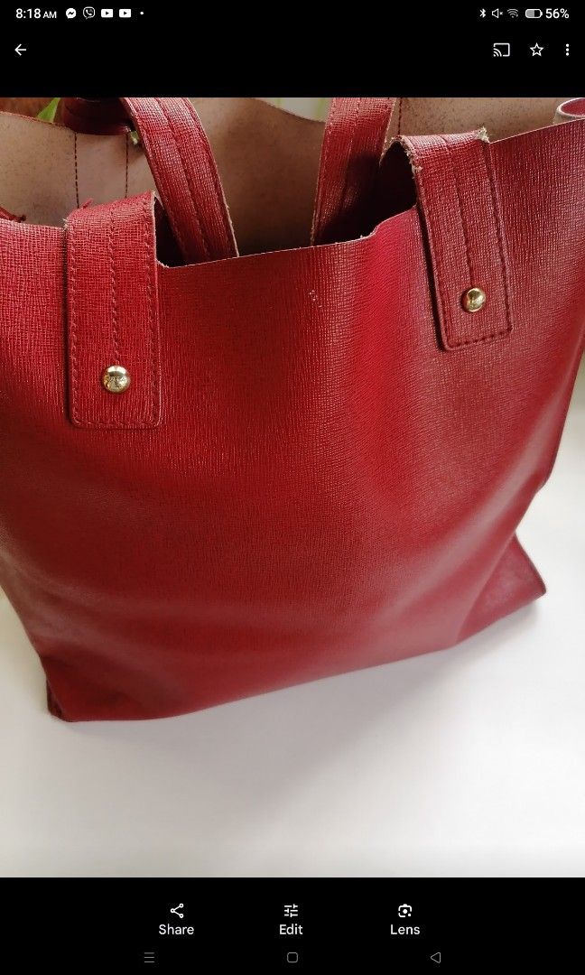 Furla bag (Category: Luxury Bags & Wallets) located in Pulilan. Submitted by smartshopper516 (Listing ID 1375841439, Image 3). Description: Furla bag Red with visible wear on the handles (I wrap it with bandana to hide it) no dust bag..