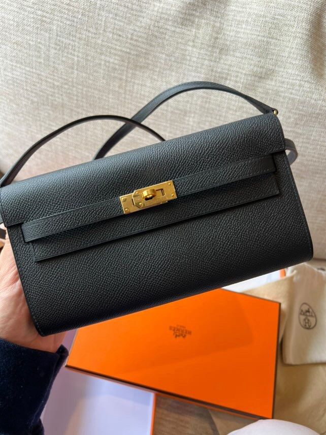 Hermes Kelly Wallet to Go (Category: Luxury Bags & Wallets) located in Pasig City. Submitted by denriola (Listing ID 1375906724, Image 2). Description: Hermes Kelly Wallet to Go (Brand New/Unused) - Change purse with zip closure - 4 credit card slots - Removable strap - Can be carried by hand, worn over the shoulder or across the body - Suitable for a large smartphone Selling below retail price. Slightly negotiable. PM for more details..