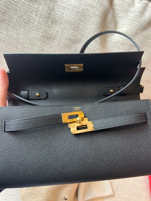 Hermes Kelly Wallet to Go (Category: Luxury Bags & Wallets) located in Pasig City. Submitted by denriola (Listing ID 1375906724, Image 3). Description: Hermes Kelly Wallet to Go (Brand New/Unused) - Change purse with zip closure - 4 credit card slots - Removable strap - Can be carried by hand, worn over the shoulder or across the body - Suitable for a large smartphone Selling below retail price. Slightly negotiable. PM for more details..
