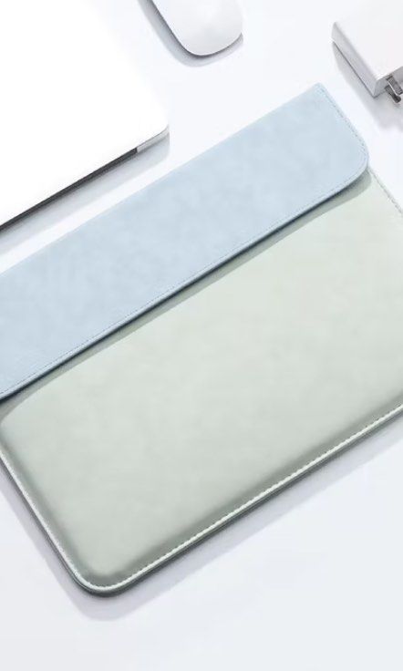 Laptop Leather Case (Category: Laptop Bags & Sleeves) located in Silang. Submitted by estherlee42572 (Listing ID 1375998825, Image 1). Description: Blue and Green Laptop sleeve Leather Material (Waterproof) Impact resistant and scratch resistant Very lightweight and clean looking Perfect for 15 inch laptops .