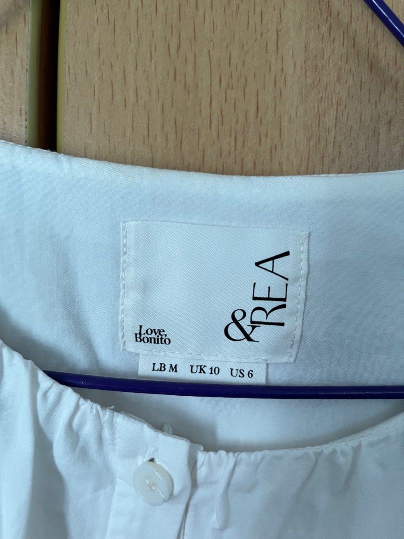LB Austen Drawstring Outer (Category: Blouses) located in Singapore. Submitted by amb0n_ (Listing ID 1375979351, Image 8). Description: size M, see measurements in pic from the andrea chong collab some time back. thought I’d get more wear out of this but nope. really nice piece though, can be worn as a blouse or as an outer jacket! price includes normal mail tags: lb love bonito austen drawstring outer blouse top button andrea chong &rea white.