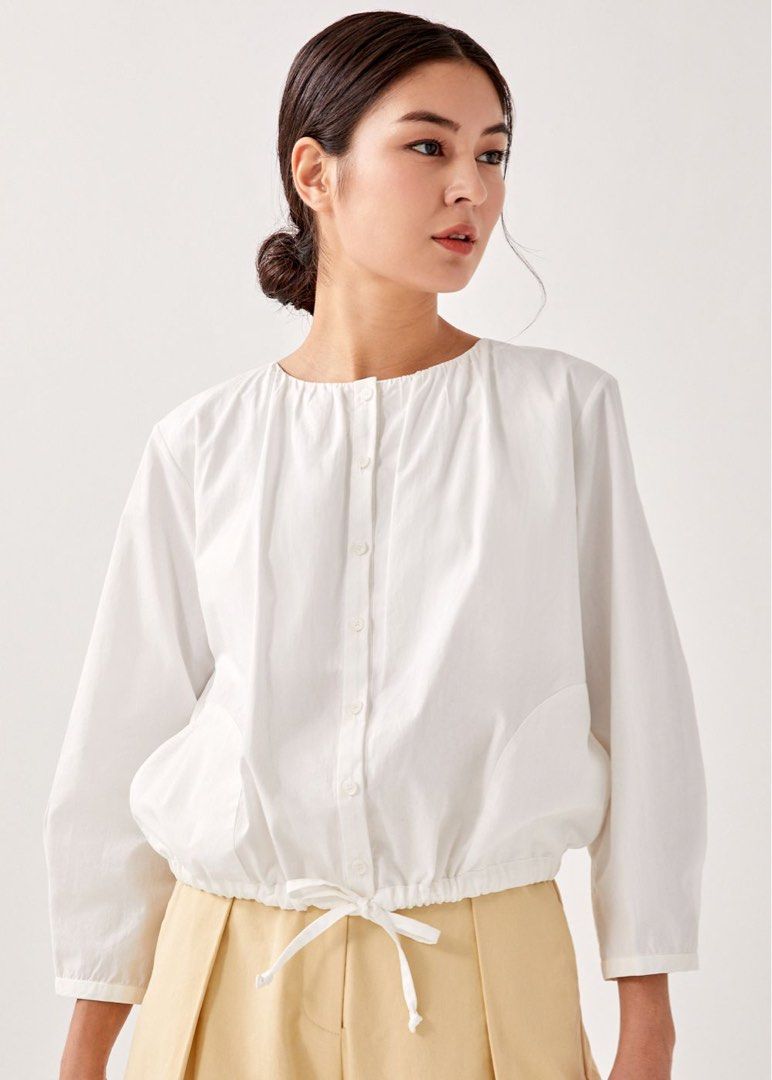 LB Austen Drawstring Outer (Category: Blouses) located in Singapore. Submitted by amb0n_ (Listing ID 1375979351, Image 4). Description: size M, see measurements in pic from the andrea chong collab some time back. thought I’d get more wear out of this but nope. really nice piece though, can be worn as a blouse or as an outer jacket! price includes normal mail tags: lb love bonito austen drawstring outer blouse top button andrea chong &rea white.