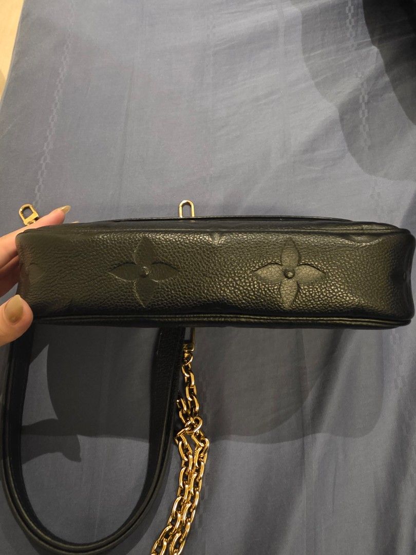 Louis Vuitton Pochette Felicie Black (Category: Bags & Wallets) located in Singapore. Submitted by cliveliew94 (Listing ID 1376004816, Image 2). Description: Authentic Louis Vuitton Pochette Felicie in black Monogram Empreinte leather. Includes chain strap and gold hardware. Versatile for any occasion..