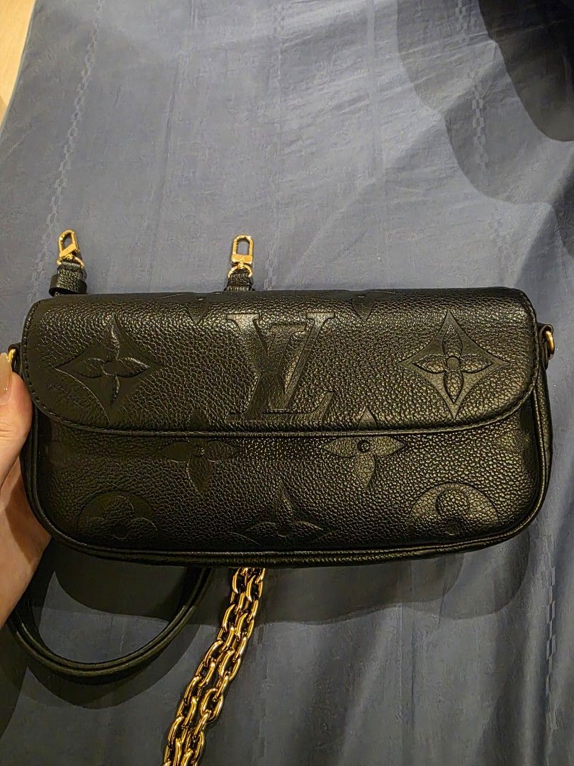 Louis Vuitton Pochette Felicie Black (Category: Bags & Wallets) located in Singapore. Submitted by cliveliew94 (Listing ID 1376004816, Image 1). Description: Authentic Louis Vuitton Pochette Felicie in black Monogram Empreinte leather. Includes chain strap and gold hardware. Versatile for any occasion..