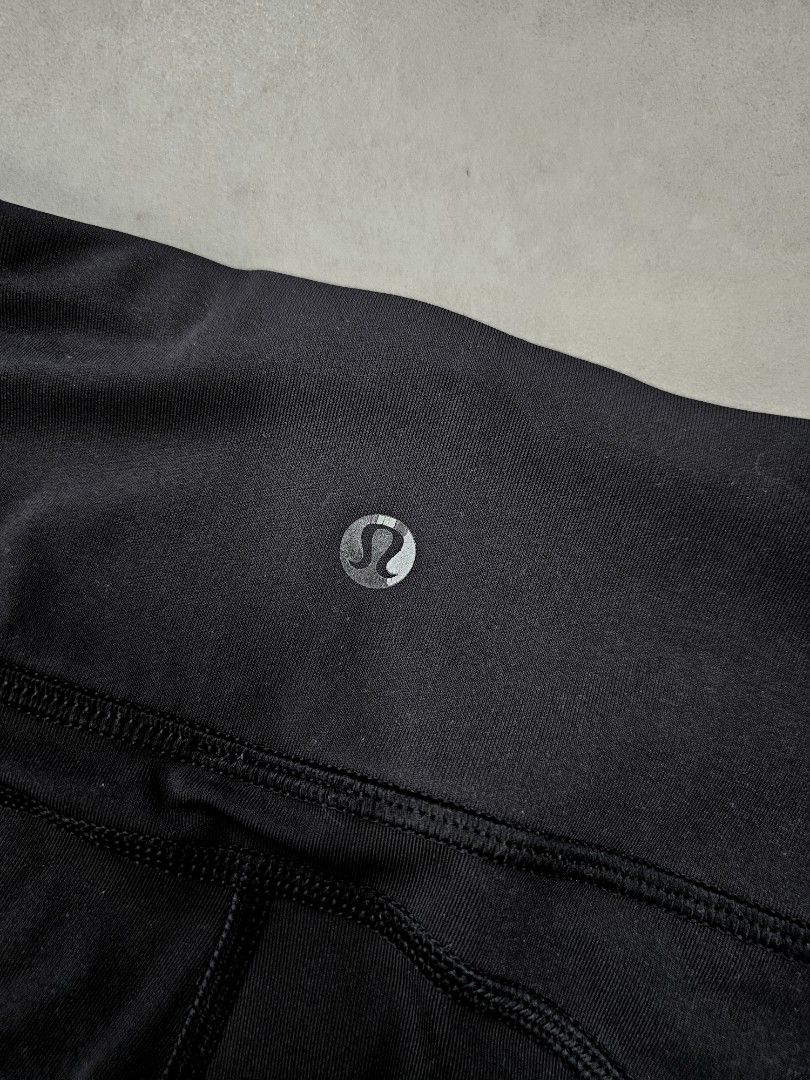 Lululemon size 8 black running tights leggings with 2 side pockets (Category: Activewear) located in Singapore. Submitted by zlearance.love (Listing ID 1375868608, Image 3). Description: still have life as a second hand piece selling off cheap authentic 2 side pockets has 2 ways reflective ankle inseam 28" price is fixed Purchase 2 items & above for free tracked mail ❤️.