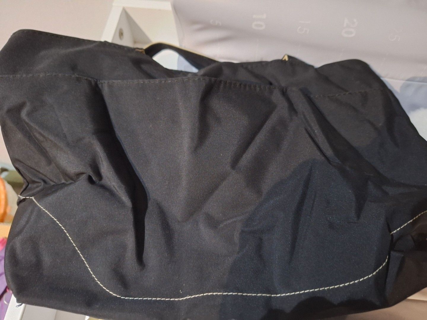 Medela Nursing Tote Bag (Category: Breastfeeding & Bottle Feeding) located in Singapore. Submitted by ja0000 (Listing ID 1375956035, Image 3). Description: Medela navy blue nursing tote bag. Features zipper closure, multiple pockets, and spacious main compartment. Perfect for baby essentials. slight defect with zip handle but can replace with keychain. .