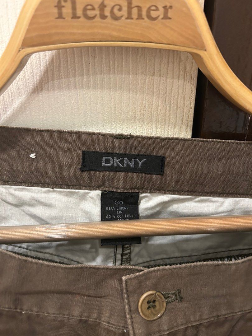 Orig DKNY Men's Trousers (Category: Trousers) located in Quezon City. Submitted by ecb0103 (Listing ID 1375859040, Image 2). Description: Original DKNY Men's pants/trousers Size 30 on tag Measurement when laid flat is waist to hem is 40 inches, waist to crotch is 12 inches Brown, khaki-ish Nice material.