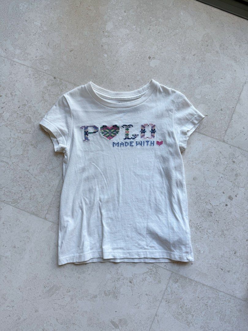 Ralph Lauren POLO t shirt (Category: Babies & Kids Fashion) located in Singapore. Submitted by candyscloset (Listing ID 1375878152, Image 1). Description: Lightly worn Tagged size 2 No stained or marks .