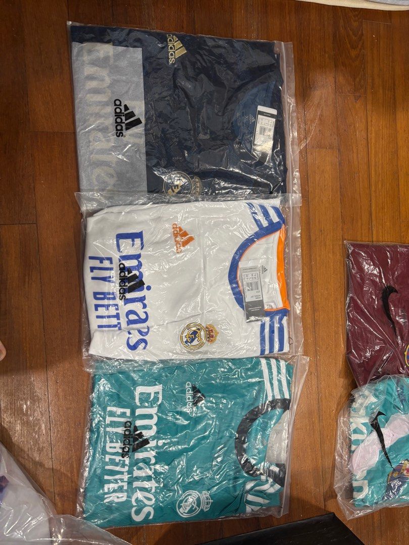 real madrid jerseys (Category: Activewear) located in Singapore. Submitted by kenpachii. (Listing ID 1375973945, Image 1). Description: the 2 on the right both 2xl first is xl only 1:1 rep hard to find as these are old kits each 25 take all 65.