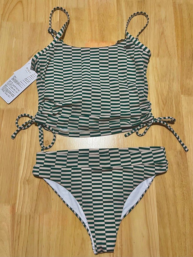Roxy Shake Tankini Set (Category: Bikinis & Swimsuits) located in San Juan, La Union. Submitted by Scully (Listing ID 1375975892, Image 3). Description: Roxy Shake Tankini set in Green Tankini-style swimsuit made of ribbed material with a textured print. The top has shirring on the side. With removable pads and adjustable straps Size Small Top Underbust: 34.0-58.0cm Length: 34.0-42.0cm Bust: 66cm Bottom Waist: 60 Rise: 21cm Only used twice! RFS: 