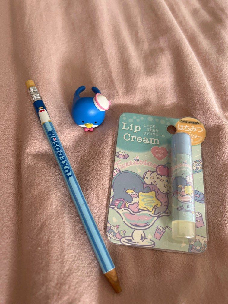Sanrio Tuxedo Sam Pen Ring & Lip Balm Set (Category: Stationery & School Supplies) located in Quezon City. Submitted by threadbareph (Listing ID 1375848034, Image 1). Description: rfs: decluttering! these were part of my tuxedo sam collection pen stil has ink but not so smooth.