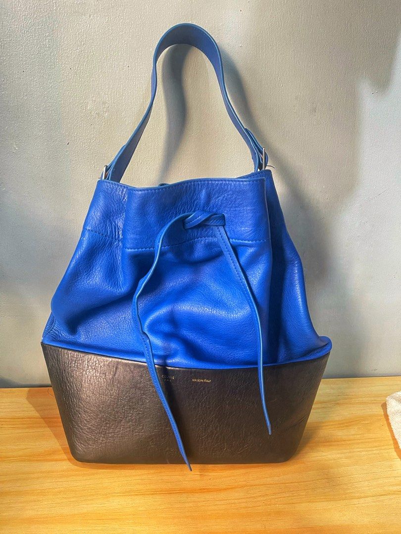 Seau Sangle leather tote Celine (Category: Luxury Bags & Wallets) located in Quezon City. Submitted by celebritycloset888 (Listing ID 1375935572, Image 3). Description: Celine Seau sangle tote / bucket bag, bi color. Bought in second hand store ni Bangkok. PM for more details.