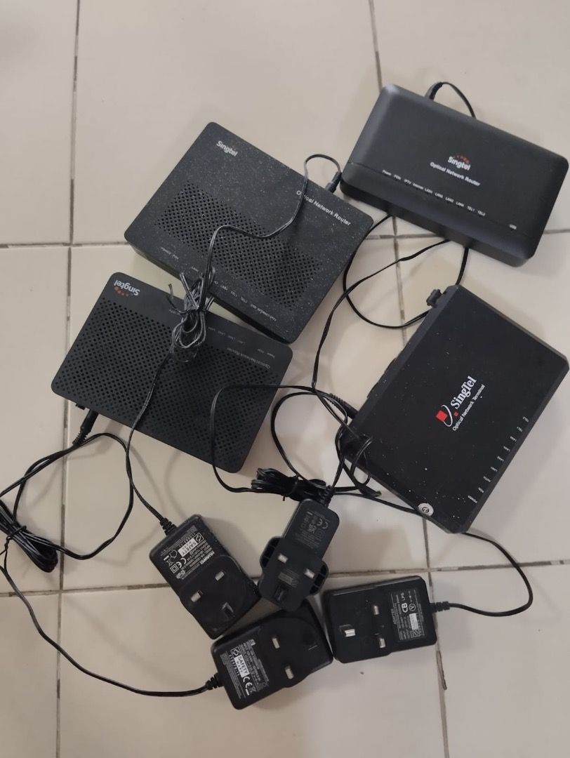 Singtel optical network terminal / Routers with Power Adapters (Category: Networking) located in Singapore. Submitted by ziyin070329615 (Listing ID 1375951798, Image 1). Description: 4 sets available $5 each set self collect from Redhill.