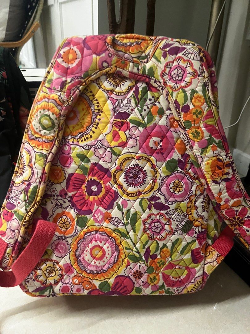 Vera Bradley Backpack Floral Print (Category: Diaper Bags & Wetbags) located in Singapore. Submitted by effdee (Listing ID 1375976903, Image 2). Description: Vera Bradley baby backpack with vibrant floral print. Features multiple zippered compartments and a quilted design. Pink accents and spacious interior with additional pockets. Ideal for everyday use or travel..