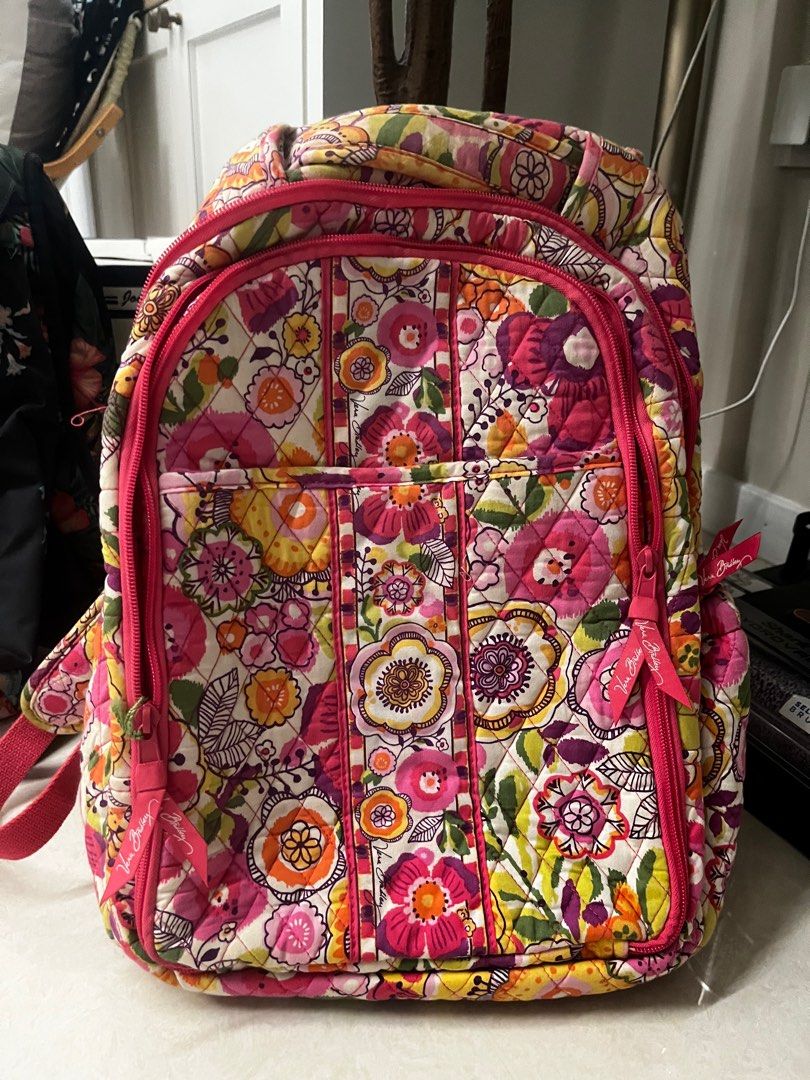 Vera Bradley Backpack Floral Print (Category: Diaper Bags & Wetbags) located in Singapore. Submitted by effdee (Listing ID 1375976903, Image 1). Description: Vera Bradley baby backpack with vibrant floral print. Features multiple zippered compartments and a quilted design. Pink accents and spacious interior with additional pockets. Ideal for everyday use or travel..