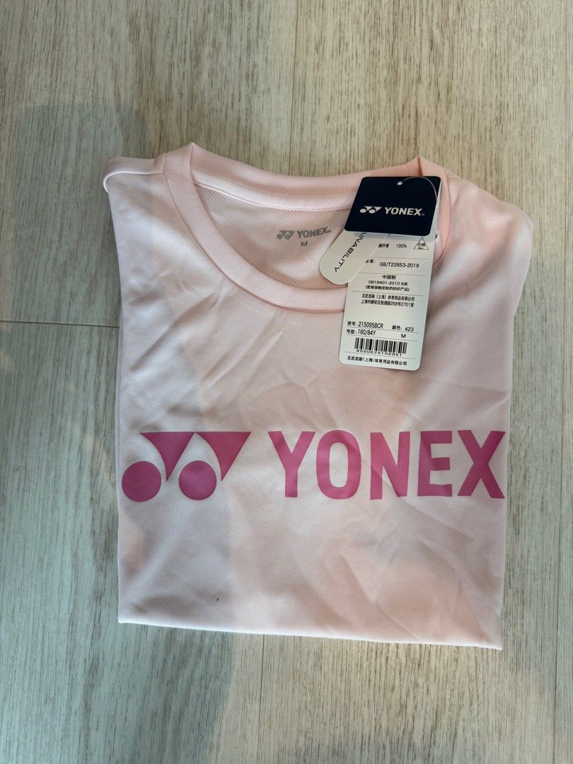Yonex Tee (Category: Activewear) located in Singapore. Submitted by uni_corn_corn (Listing ID 1375901310, Image 1). Description: Ladies cut. Length 60cm Chest 45cm Sleeves 15.5cm Top up for mailing.