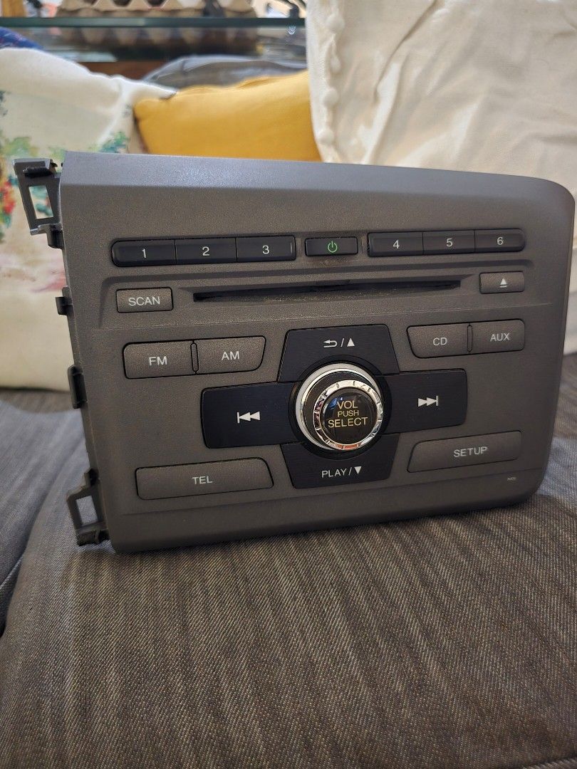 2012 Honda Civic OEM head unit (Category: Audio, Video, Alarm and other Electronic Accessories) located in Taguig. Submitted by weselllife (Listing ID 1376053043, Image 1). Description: OEM (stock) head unit from a 2012 Honda Civic Exi variant, made in Japan. CD player FM/AM radio AUX input Telephone button (for hands-free) rfs : replaced with android auto.