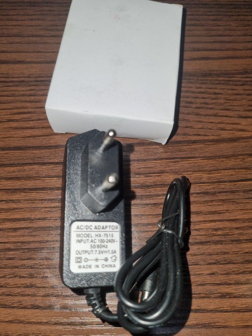 AC/DC Adaptor (Category: Electrical, Adaptors & Sockets) located in Paombong. Submitted by sweetdeals0181656 (Listing ID 1376166566, Image 2). Description: Model: HX-7515 Input: AC 100-240 V 50-60 Hz Output:7.5 V= 1.5 A We have 15 pieces available Can be sold in bundle send an offer.