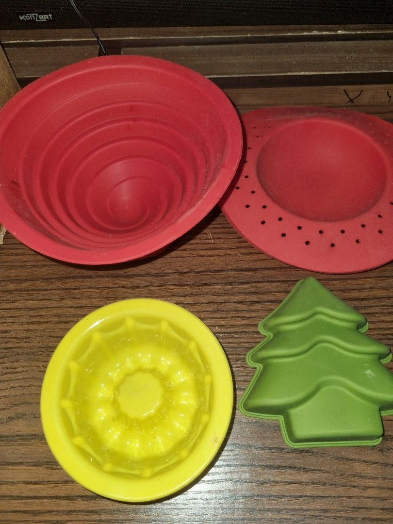 Assorted Silicon Molds (Category: Other Kitchenware & Tableware) located in Paombong. Submitted by sweetdeals0181656 (Listing ID 1376163139, Image 2). Description: 2 Red SantaClaus Length 5 inches 1 Green Snowman Length 10 inches x Width of widest part 6 inches x Height 2 inches 1 Christmas Tree Length 4.5 inches 1 Yellow Mold Diameter 5 inches Height 1.8 incjes 1 Red Round Mold Diamter 7 inches 1 Red with Spiral Pattern Diameter 7 inches Height 