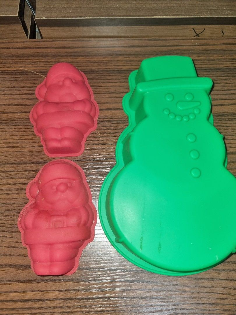 Assorted Silicon Molds (Category: Other Kitchenware & Tableware) located in Paombong. Submitted by sweetdeals0181656 (Listing ID 1376163139, Image 3). Description: 2 Red SantaClaus Length 5 inches 1 Green Snowman Length 10 inches x Width of widest part 6 inches x Height 2 inches 1 Christmas Tree Length 4.5 inches 1 Yellow Mold Diameter 5 inches Height 1.8 incjes 1 Red Round Mold Diamter 7 inches 1 Red with Spiral Pattern Diameter 7 inches Height 