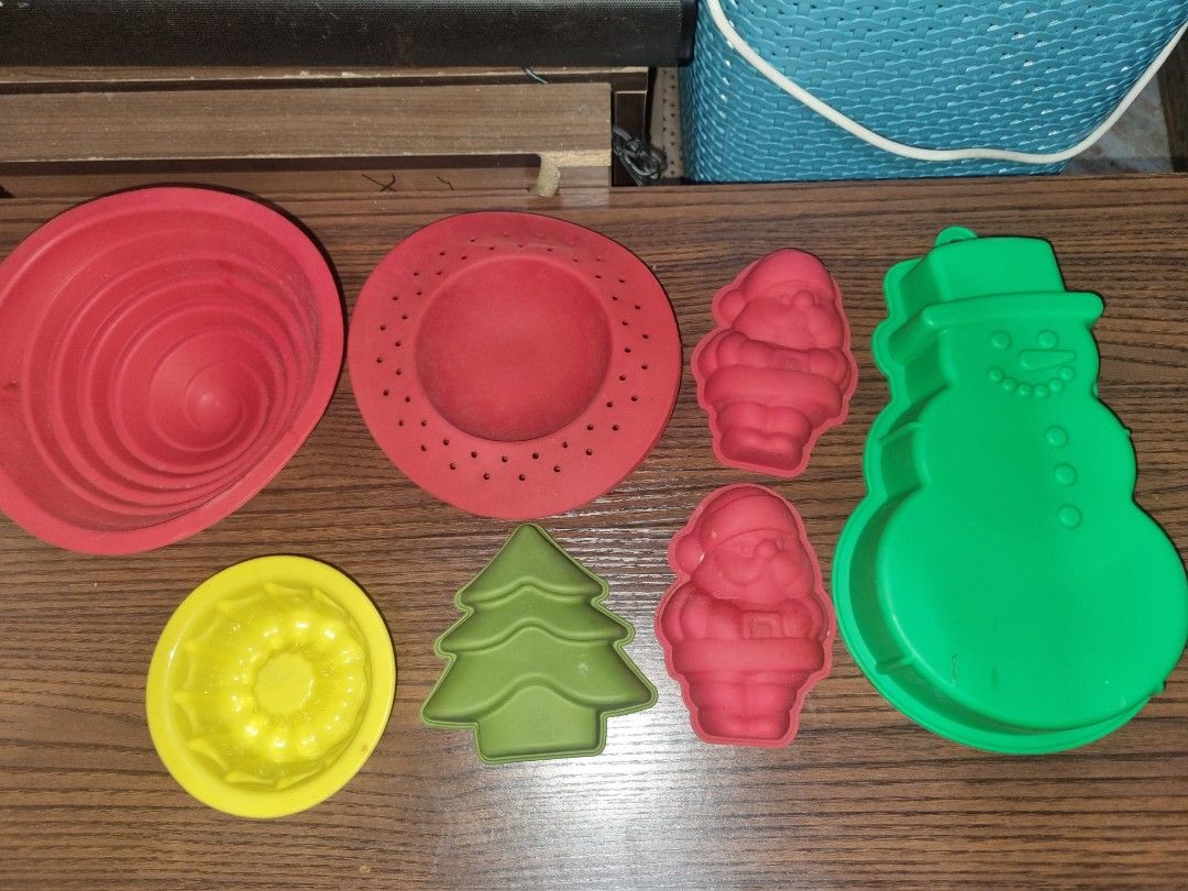 Assorted Silicon Molds (Category: Other Kitchenware & Tableware) located in Paombong. Submitted by sweetdeals0181656 (Listing ID 1376163139, Image 1). Description: 2 Red SantaClaus Length 5 inches 1 Green Snowman Length 10 inches x Width of widest part 6 inches x Height 2 inches 1 Christmas Tree Length 4.5 inches 1 Yellow Mold Diameter 5 inches Height 1.8 incjes 1 Red Round Mold Diamter 7 inches 1 Red with Spiral Pattern Diameter 7 inches Height 