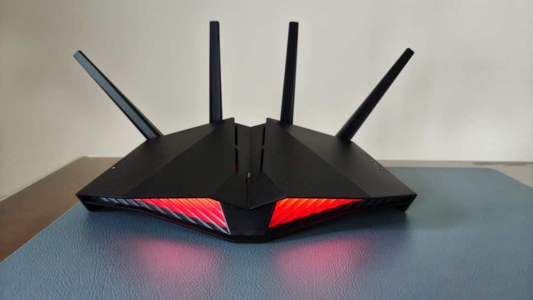 ASUS WiFi 6 Router RT-AX82U (Category: Networking) located in Singapore. Submitted by fashion.chic (Listing ID 1376068687, Image 1). Description: AX5400 Dual Band WiFi 6 (802.11ax) and 160MHz channels ASUS Aura RGB lighting efects ASUS AiMesh support IO ports include RJ45 Gigabits BaseT for WAN x 1, RJ45 Gigabits BaseT for LAN x 4 USB 3.2 Gen 1 x 1 Weight 740 g Dimensions 275.5 x 184.4 x 165 mm (WxDxH) ASUS estore price S$269.00 Item in good cond