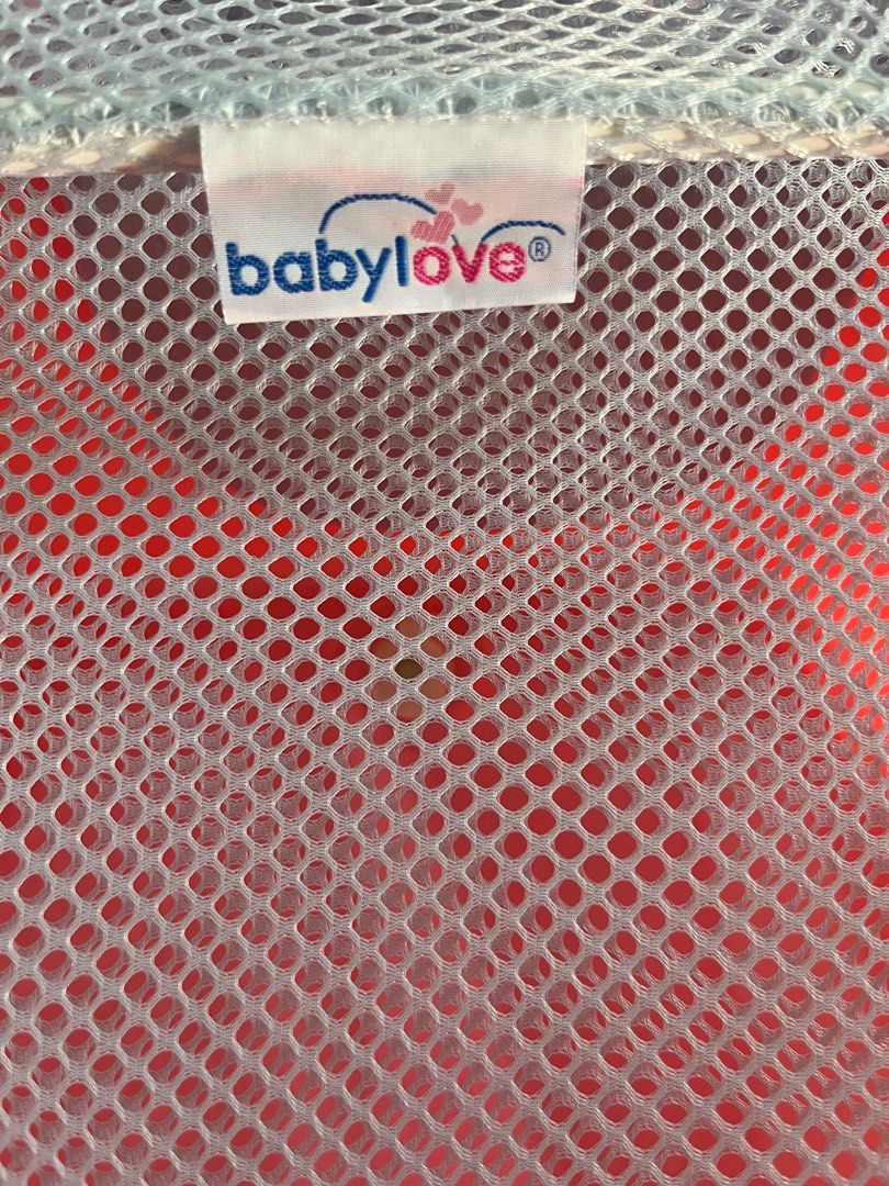 BabylOVE Pillow & Mesh Bath Bed (Category: Bathtub & Bath Accessories) located in Singapore. Submitted by imgniq (Listing ID 1376023596, Image 2). Description: - BabyLOVE Pillow & Mesh Bath Bed for newborns and infants. (Used once for 5 mins!) - Supportive mesh design. - Soft headrest pillow. - Lightweight and easy to clean. - Suitable for most standard bathtubs. - Provides comfortable and secure support during bath time. If you need a baby bounc