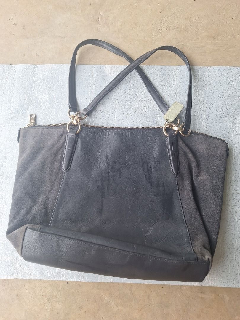 COACH Kelsey Satchel Bag (Category: Luxury Bags & Wallets) located in Malaybalay. Submitted by mags_sofia (Listing ID 1376063925, Image 3). Description: Dimensions: L: 15.5", W: 4", H: 11" Material: - leather and cowhide exterior - clothed interior - leather handles - gold brass hardware Compartments: - main compartment and 1 zipped pocket and two slots Signs of Wear: - leather handles are wearing off - exterior is slightly worn off - interior is