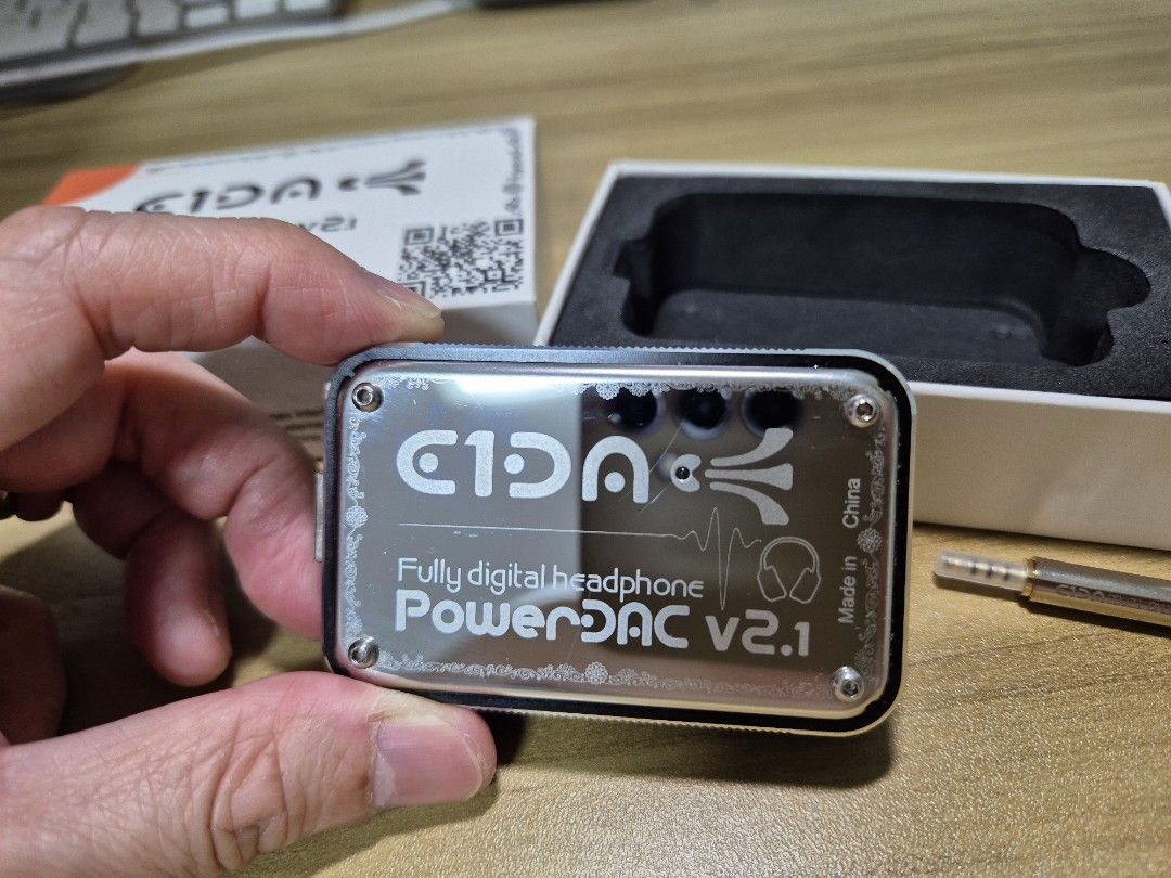 E1DA Power DAC v2.1 (Category: Portable Audio Accessories) located in Singapore. Submitted by tchun4321 (Listing ID 1376077411, Image 1). Description: This is powerful headphone DAC Amp that gives a pleasant sound. Able to perform frequency tuning via the HPToy app. It is in excellent condition..