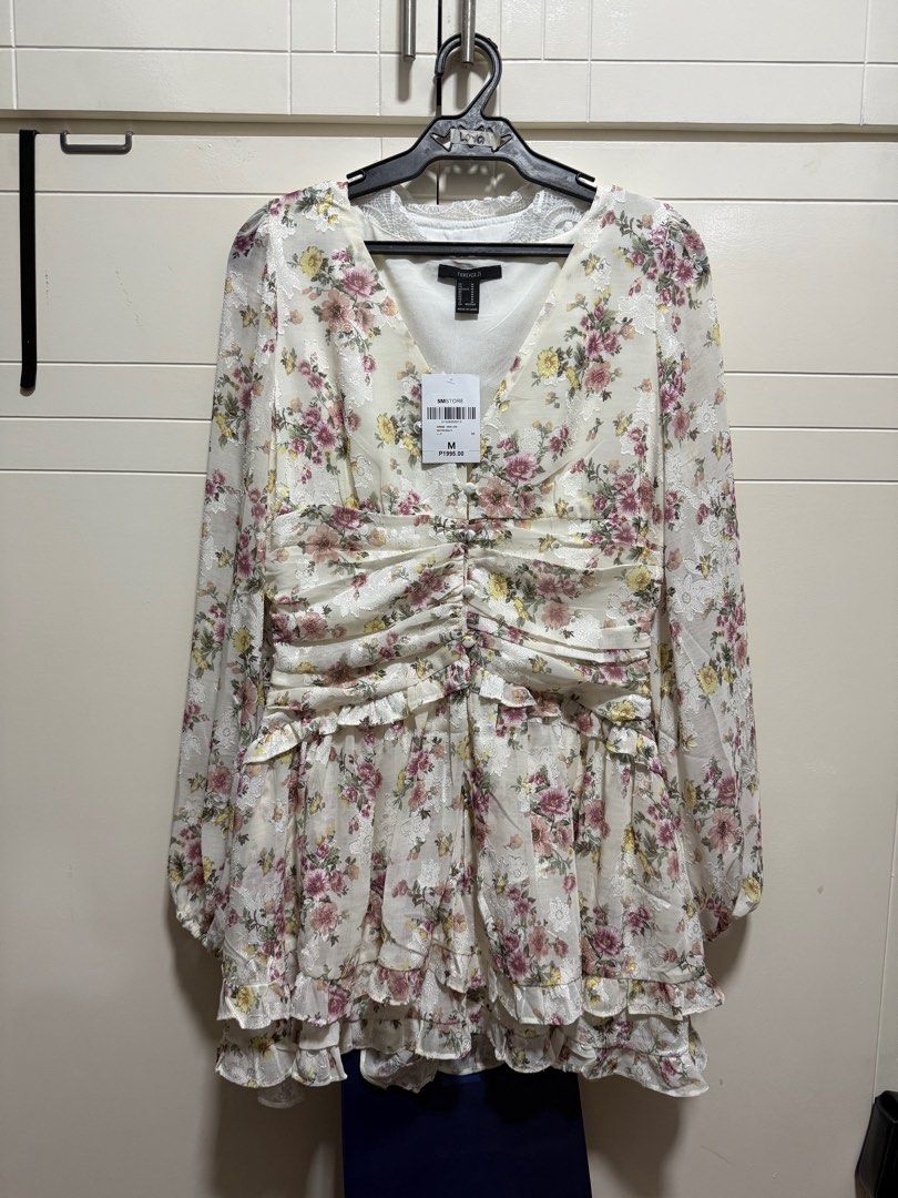 Floral party dress (Category: Dresses) located in Angeles City. Submitted by lcm19 (Listing ID 1376194258, Image 1). Description: Can fit small to medium size.