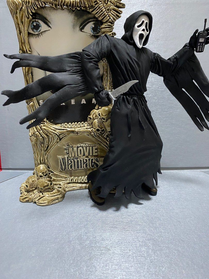 McFarlane Ghostface (Category: Toys & Games) located in Singapore. Submitted by americachavez (Listing ID 1376202913, Image 1). Description: McFarlane Ghostface that comes with a knife, a phone and a movie poster. His design based off how he looked in the Scream Franchise.