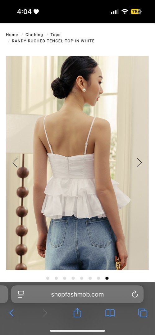 Randy Ruched Tencel Top in White (Category: Sleeveless) located in Singapore. Submitted by gnxsh (Listing ID 1376105284, Image 2). Description: Beautiful white tencel top with ruched details at front and back. Features a V-neckline, adjustable straps, and a double tiered peplum flare at the waist. Concealed back zip and non-detachable bandeau padding at chest. Fabric is not stretchable. Measurements are in the listing..