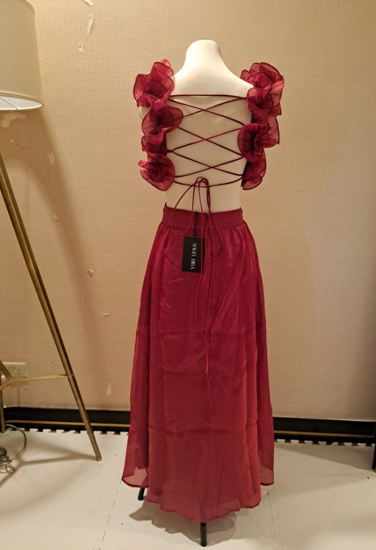 Ruffle Cut Out Deep Red Gown (Category: Dresses) located in Makati City. Submitted by corglee (Listing ID 1376208196, Image 3). Description: Brand new w tag Brand: Angel Biba Size : S Color: Deep Red Bust 34-36 in Waist 26-28 in Length: 54 in P1880 IG: LuxeManilaHub.