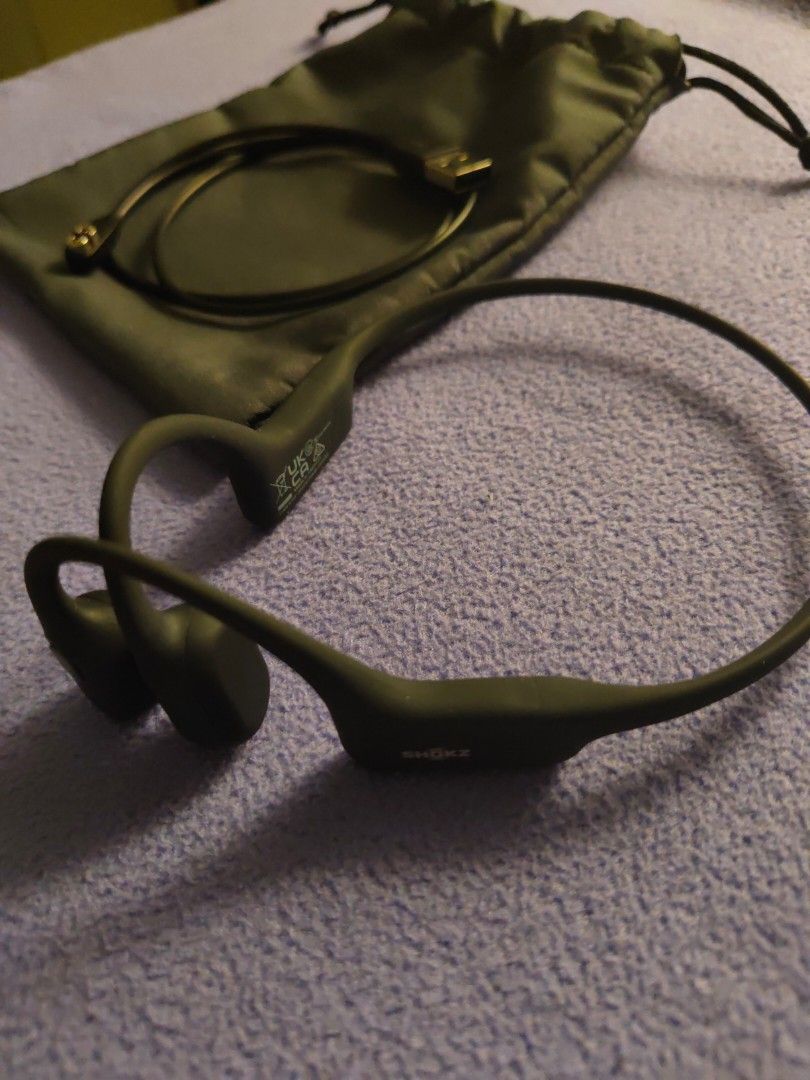 Shokz Bone Conduction Headphones (Category: Earphones) located in Pasig City. Submitted by janelchoo (Listing ID 1376184848, Image 3). Description: Used 2x, just not fit for my lifestyle. Bought in the US, April 2025. No issues. Complete with box, charger, pouch and free hard case. Negotiable..
