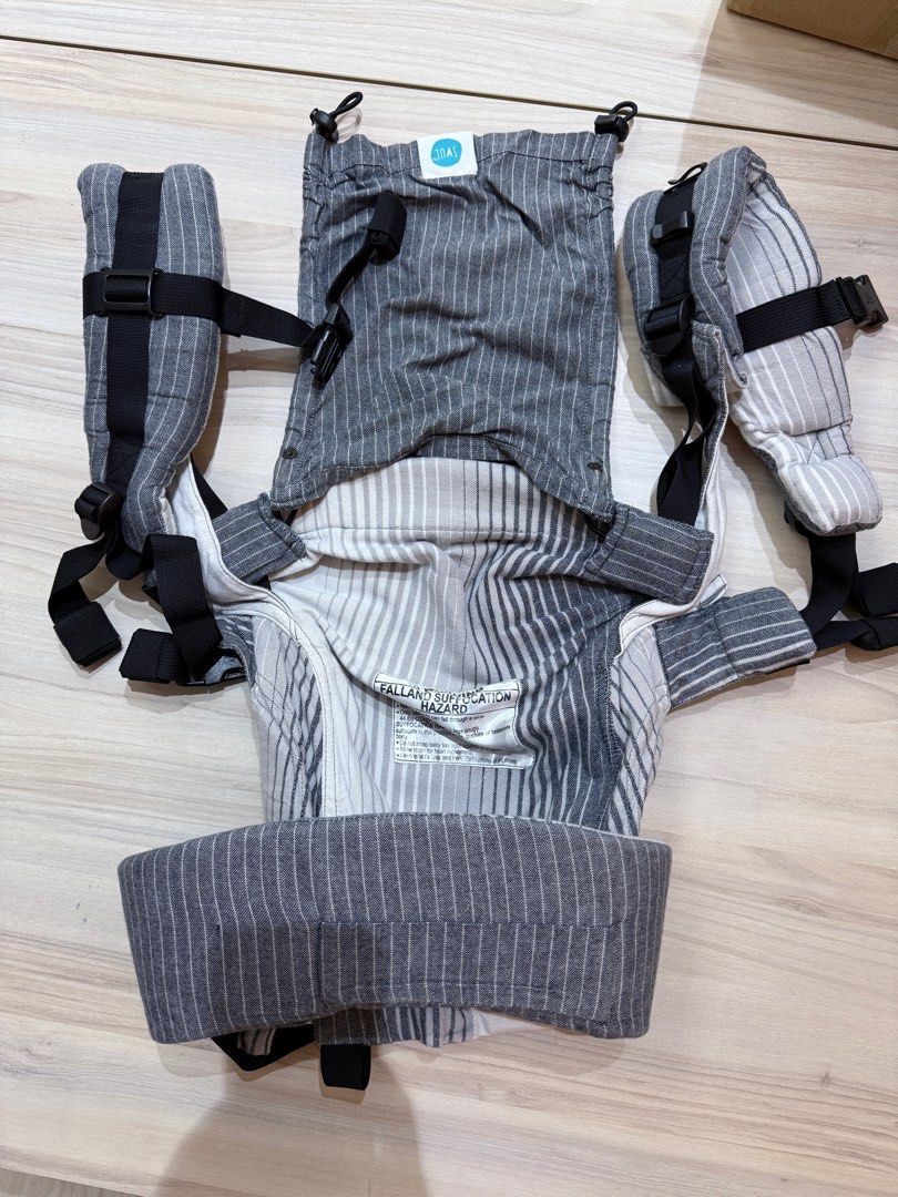 Soul Sling Aseema (Grey) (Category: Carriers & Slings) located in Singapore. Submitted by elkkkk (Listing ID 1376168097, Image 2). Description: SoulSlings Aseema Carrier, used but in great condition. Super easy to use and it distributes baby’s weight very well, so you have ease of carrying your baby while walking around. Used this mostly during travels. 2nd pic shows me carrying my baby at our Japan trip. Baby naps very well in it. Newborn to Tod