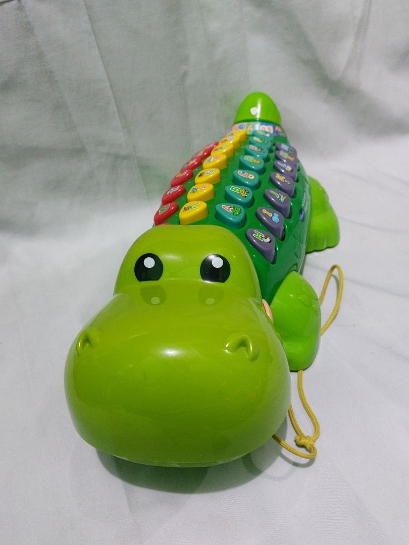 Vtech Pull & Learn Alligator (Category: Educational & Learning Toys) located in Paranaque City. Submitted by ca.firstonlinebiz (Listing ID 1336737523, Image 3). Description: Preloved Vtech Pull & Learn Alligator Lights and sounds working well English Language All buttons are working Battery not included needs 2xAA Loc. Greenheights Parañaque Open for shipping lalamove jnt or flash Gcash, Maya, BPI payment.