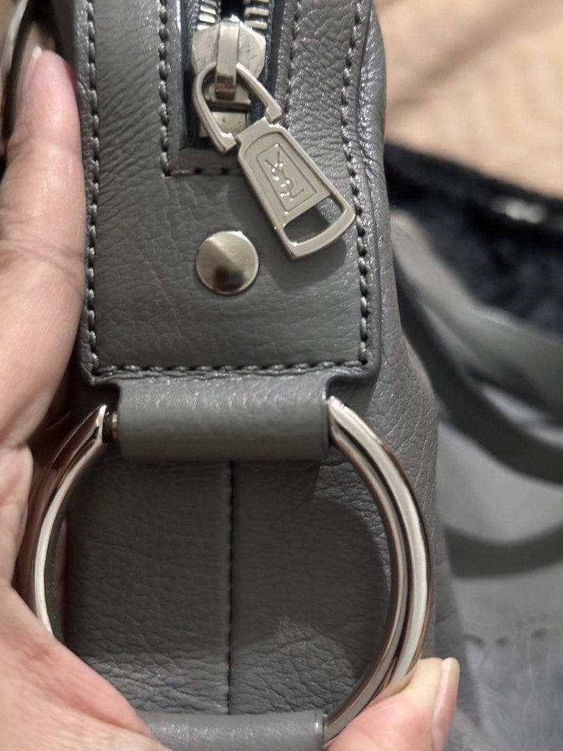 YSL Muse Bag (Category: Luxury Bags & Wallets) located in Quezon City. Submitted by decluttertherapymnl (Listing ID 1374493549, Image 2). Description: For Sale Authentic/Real YSL Muse Bag With serial code Lockset Pulido logos Few flaws. RFS: Need cash Pick up at Pasig Payment via E Cash or Online Bank.