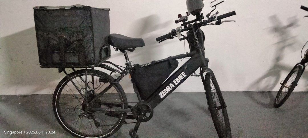 Zebra model M Ebike Electric Bicycle (Category: E-Scooters & E-Bikes) located in Singapore. Submitted by xtr3m (Listing ID 1376189550, Image 1). Description: Zebra Ebike for sale. Black frame and wheels. Excludes rear carrier and pannier bag. Perfect for commutes and errands. LTA compliant stock bikes ownership transferrable $900 comes with 1 original batt $1000 comes with 2 original batt.