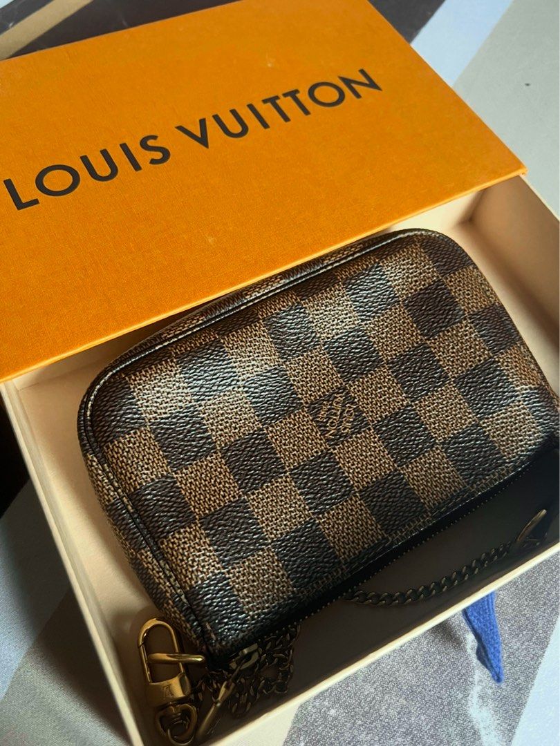 Authentic Louis Vuitton Mini Pochette Accessoires (Category: Luxury Bags & Wallets) located in Manila. Submitted by urbantrendsetter (Listing ID 1376276700, Image 1). Description: Date code: SF4290 Year 2020 Srp Php 42,xx .00 Inclusion: box only The Mini Pochette Accessoires in Damier Ebene canvas is the perfect way to carry essentials. Its supple, rounded shape gives this pouch a particularly pleasant feel, while its zipped compartment offers a 