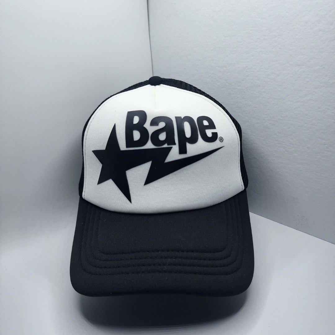 BAPE TRUCKER HAT (Category: Caps & Hats) located in Quezon City. Submitted by randomthangz (Listing ID 1376305137, Image 1). Description: bape trucker hat.