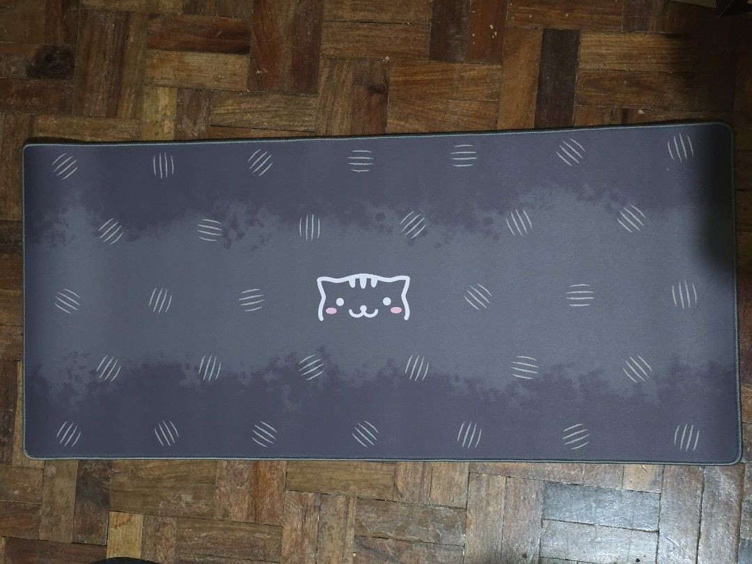 Cat design desk mat (Category: Mouse & Mousepads) located in Quezon City. Submitted by moonstruckery (Listing ID 1376395346, Image 1). Description: Never used. For keyboard and mouse..